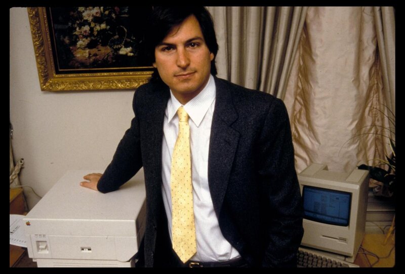 Steve Jobs with early Apple products