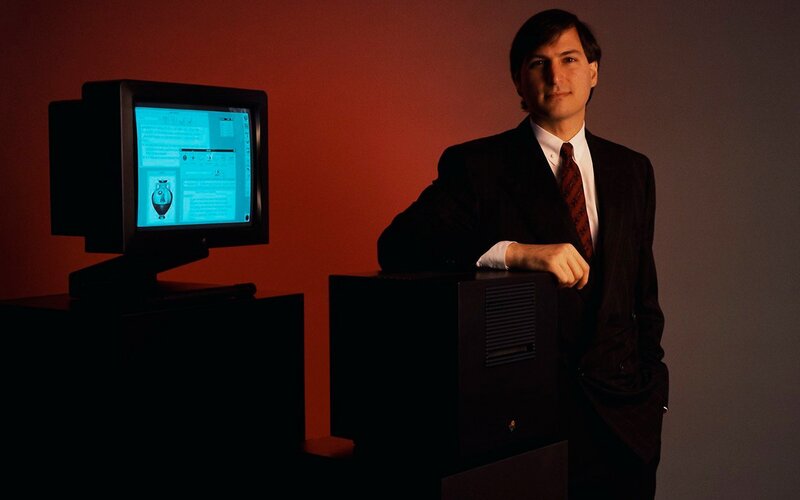 Steve Jobs with early Macintosh