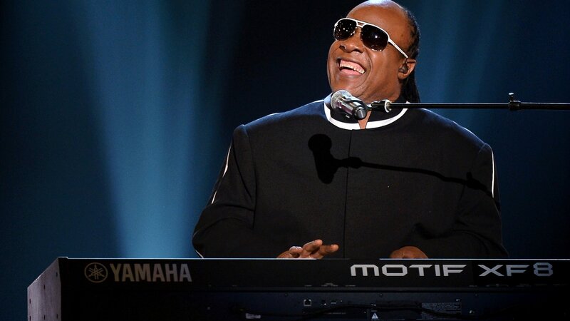 Stevie Wonder performing on stage