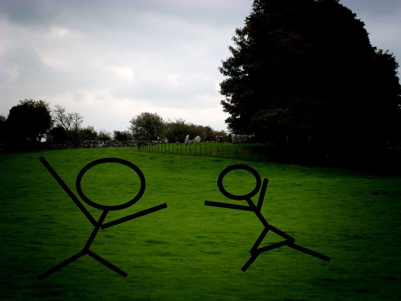 Stick figures in a field