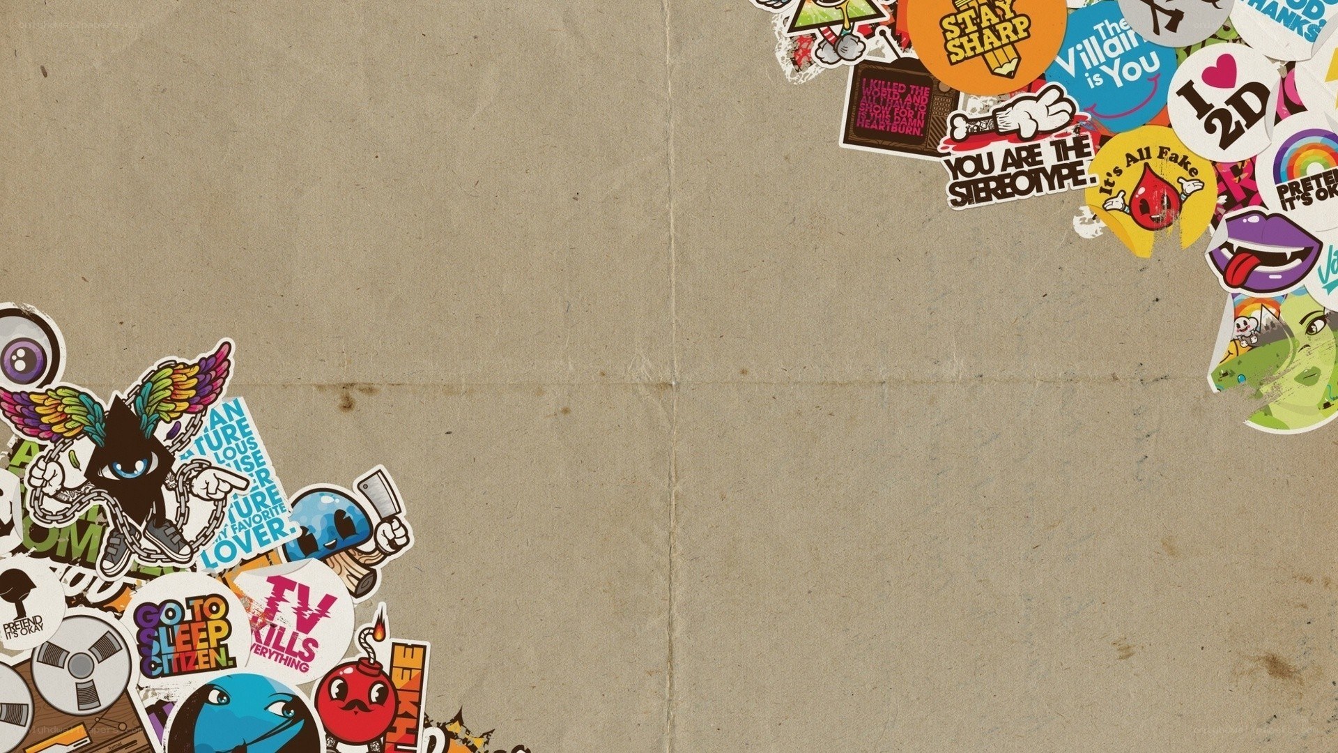 sticker-covered cardboard background