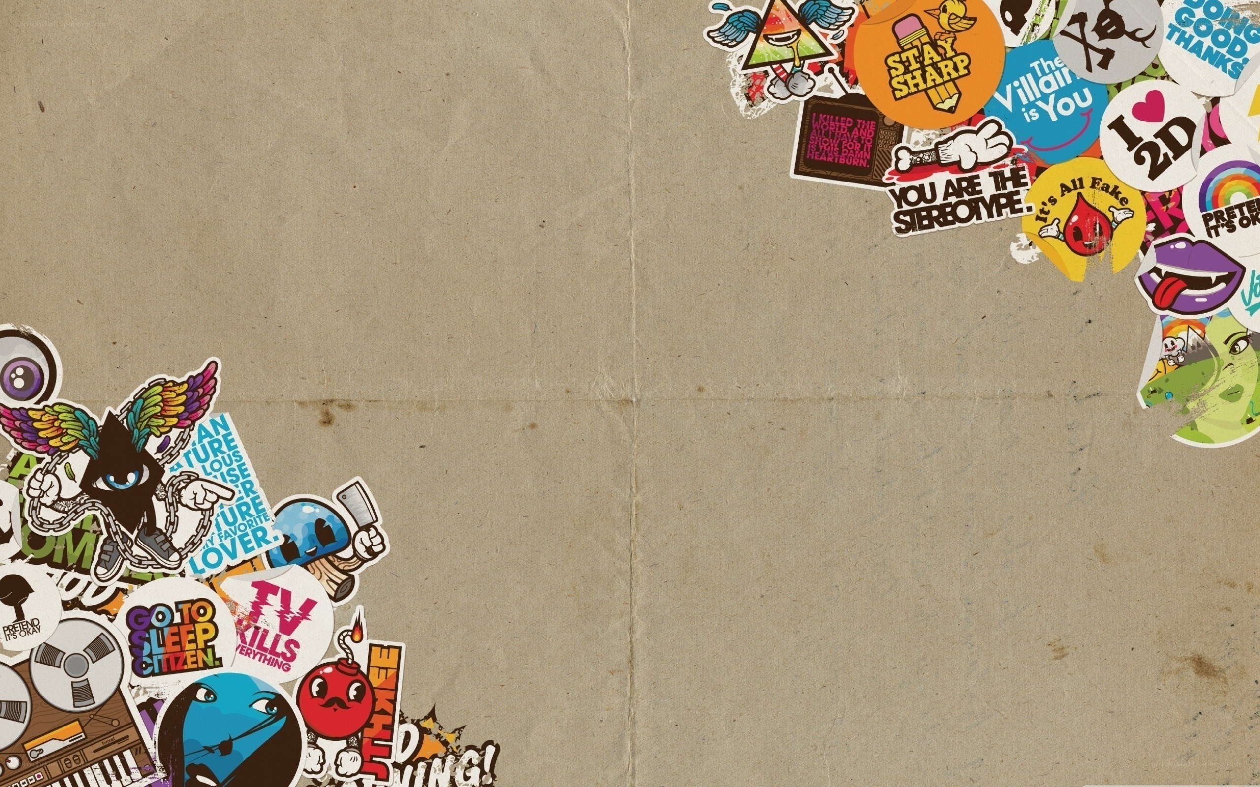 sticker-covered cardboard background