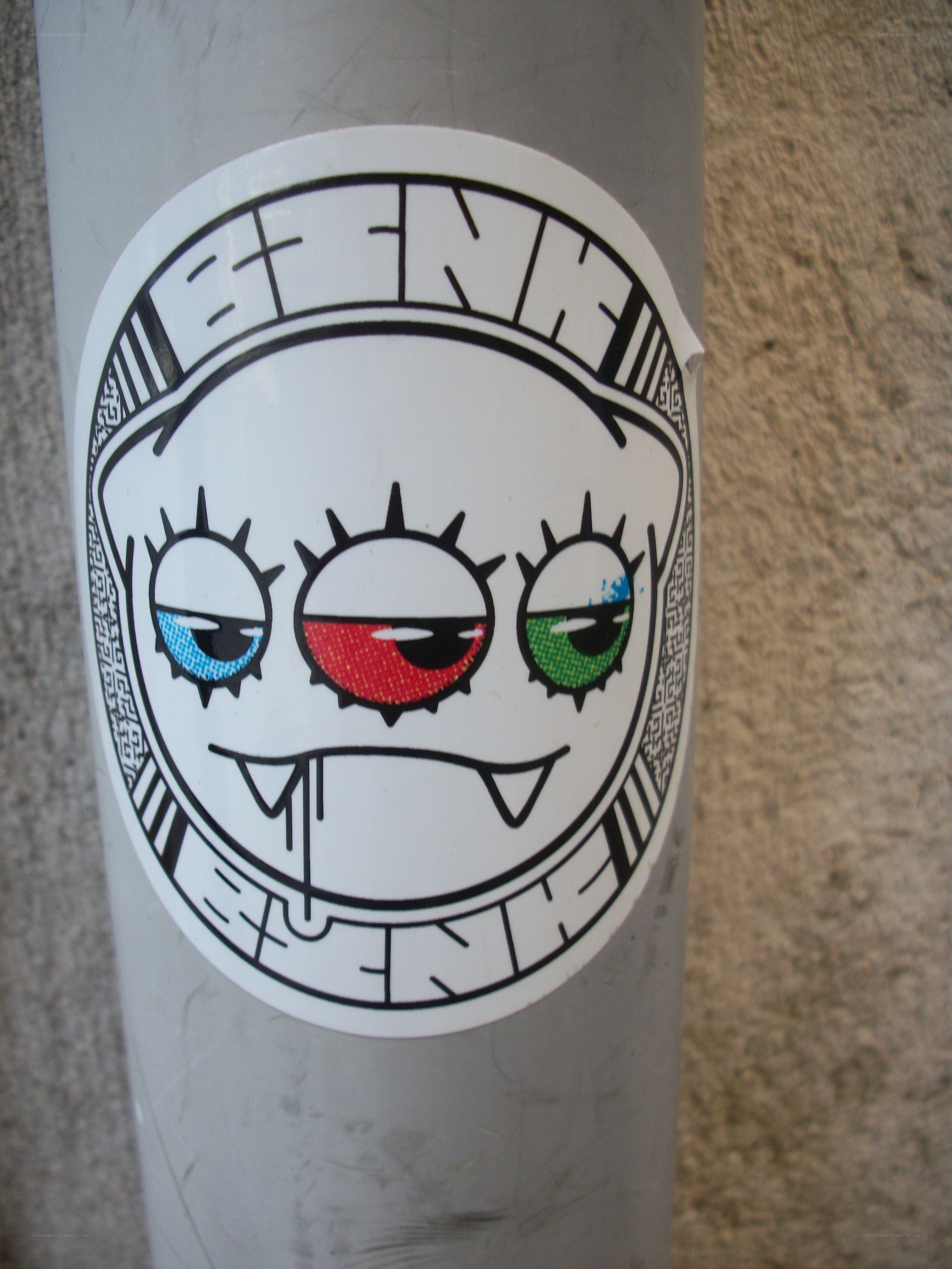 sticker with cartoon monster face