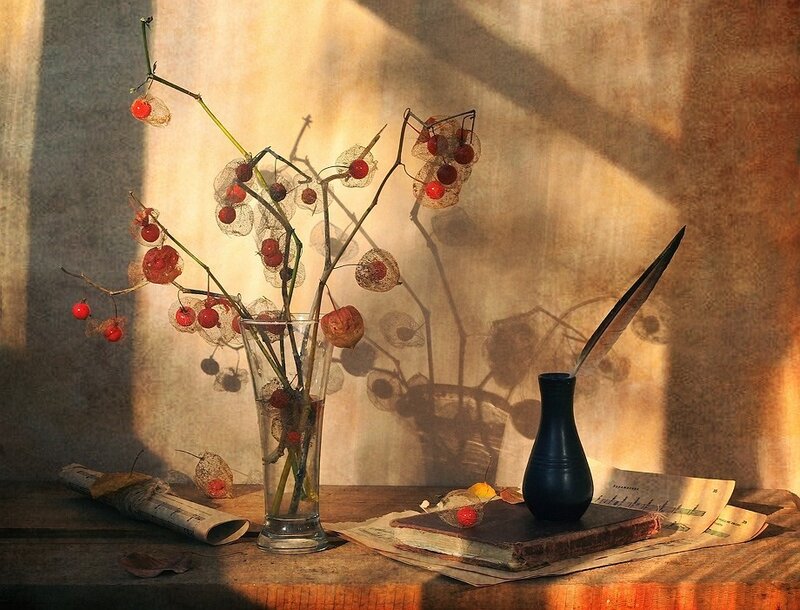 Still life with berries and quill