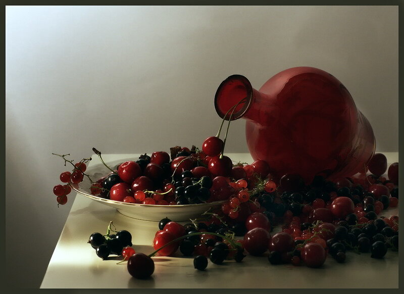 Still life with berries and red jug