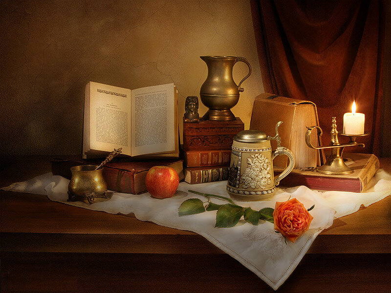 Still life with books and candle