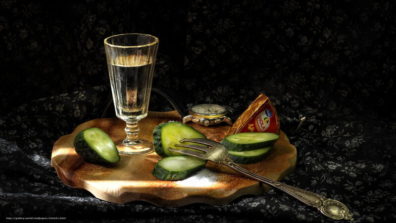 Still life with cucumbers and glass
