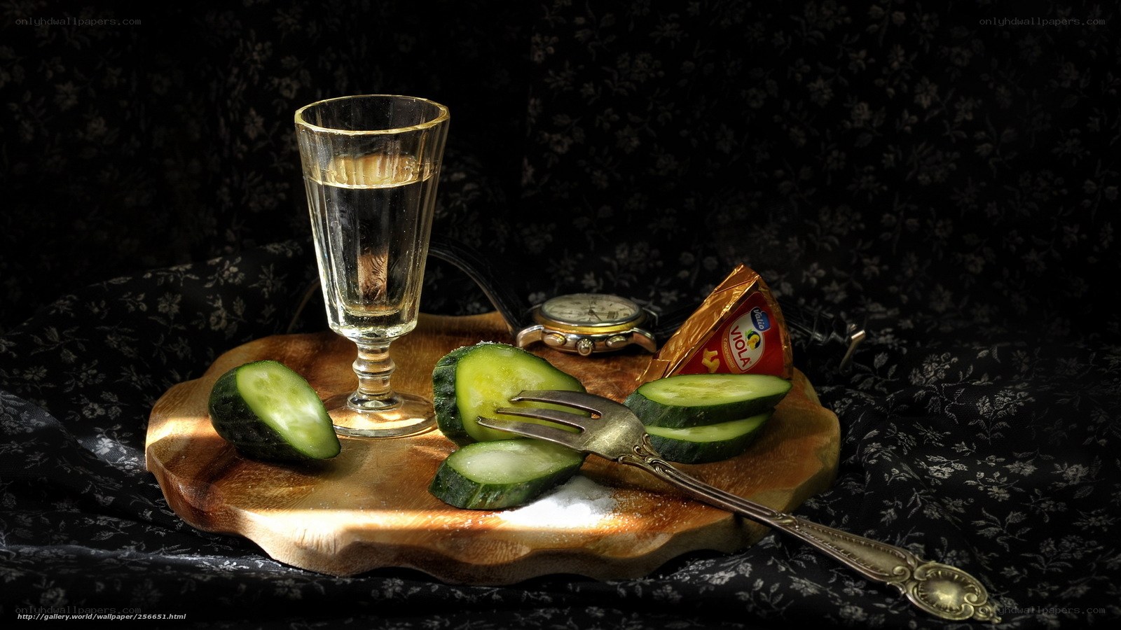 Still life with cucumbers and glass