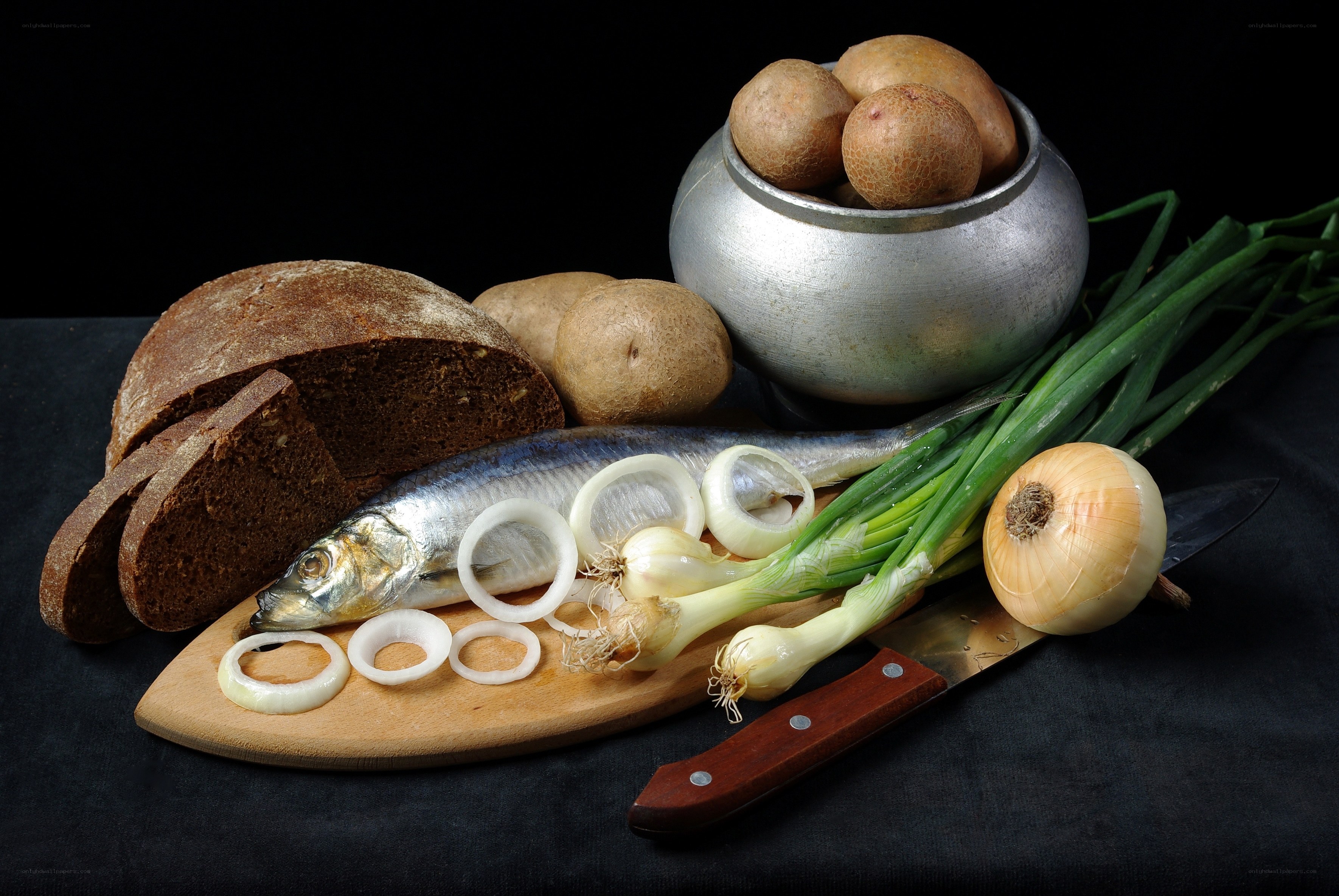 Still life with fish and bread