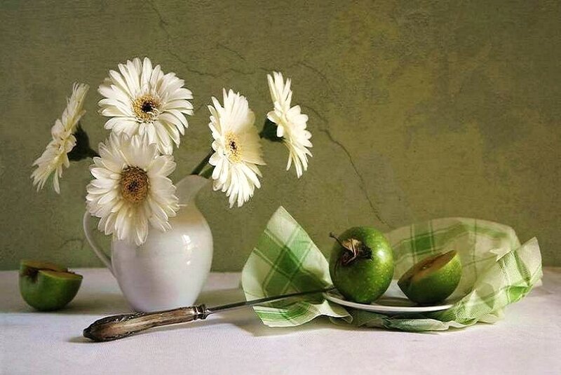 Still life with flowers and apples
