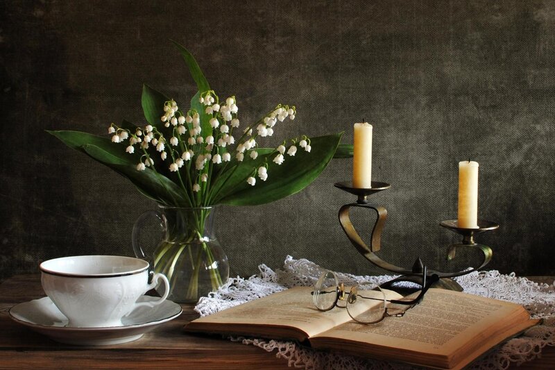 Still life with flowers and book