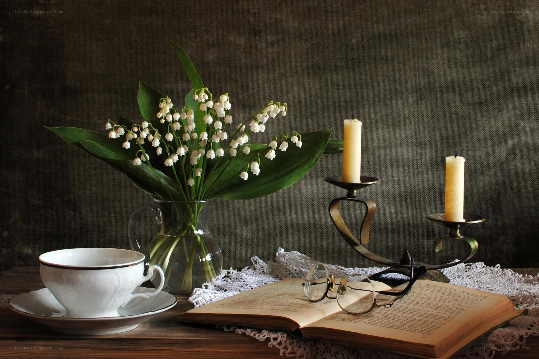 Still life with flowers and book