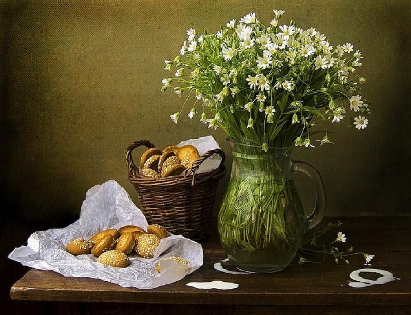 Still life with flowers and bread