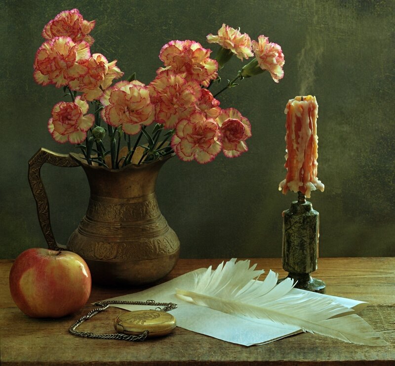 Still life with flowers and candle