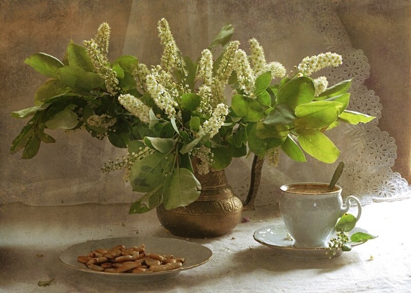 Still life with flowers and coffee