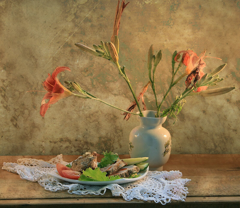 Still life with flowers and food