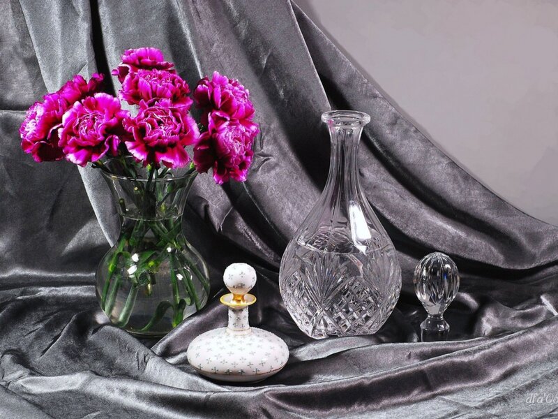 Still life with flowers and glassware