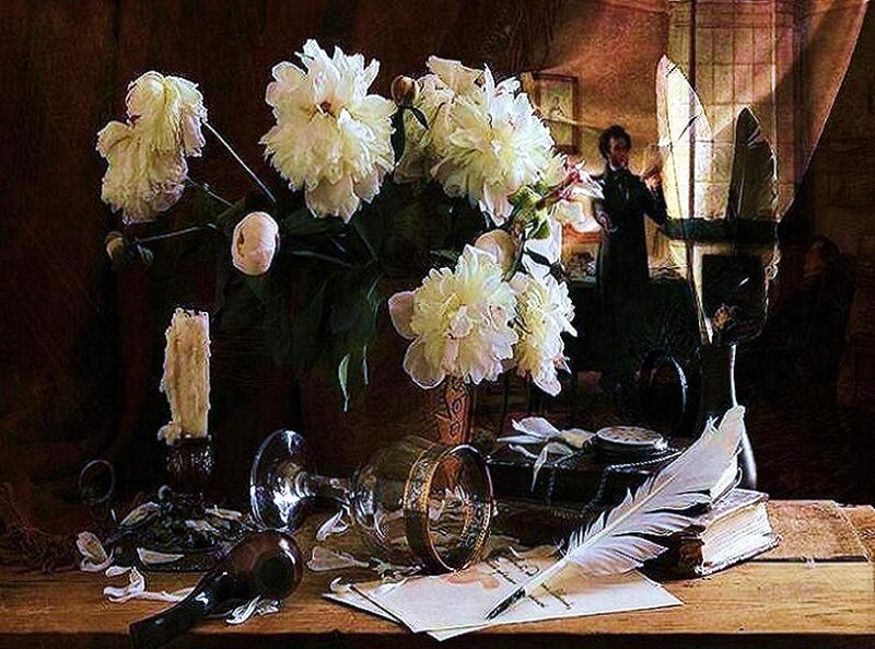 Still life with flowers and writing tools