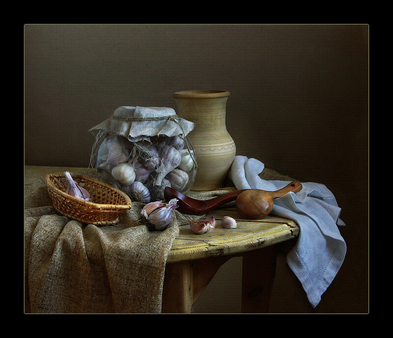 still life with garlic and pottery