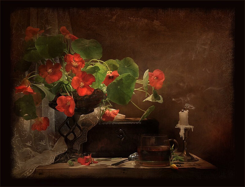 Still life with nasturtiums and candle