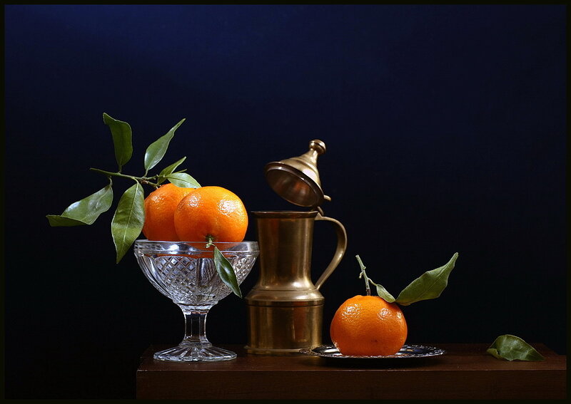 Still life with oranges and brass pitcher