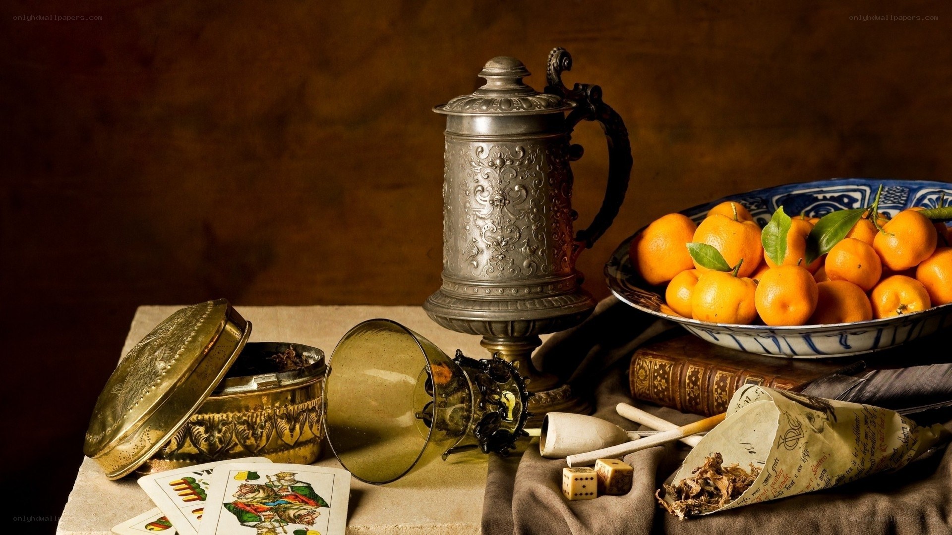 Still life with oranges and silver