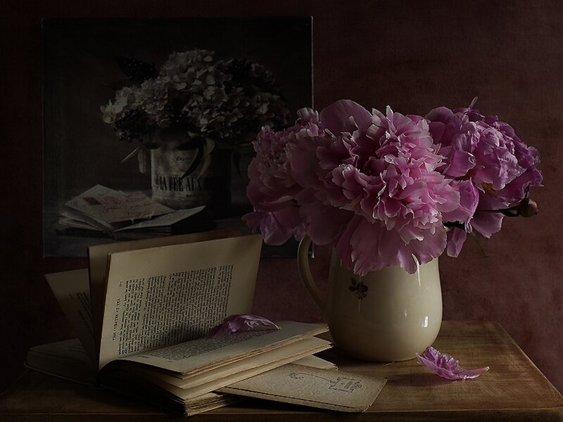 Still life with peonies and book