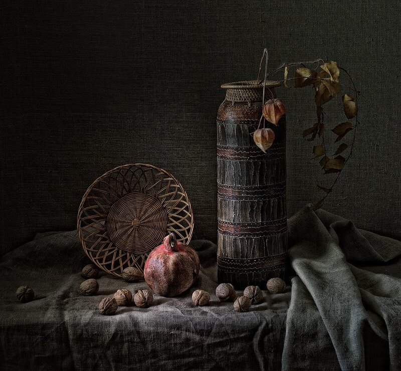 Still life with pomegranate and basket