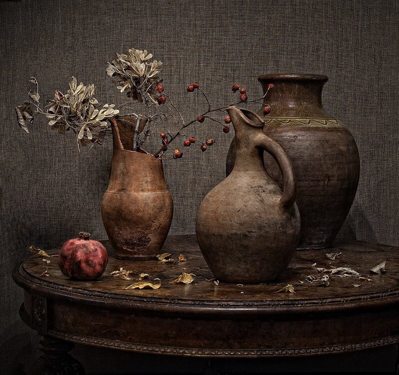 Still life with pottery and pomegranate