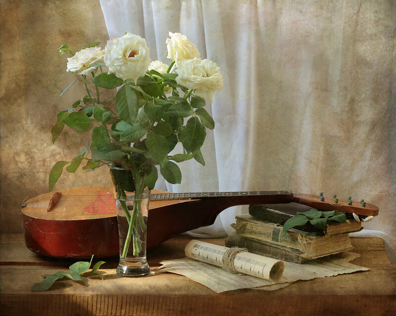 Still life with roses and guitar