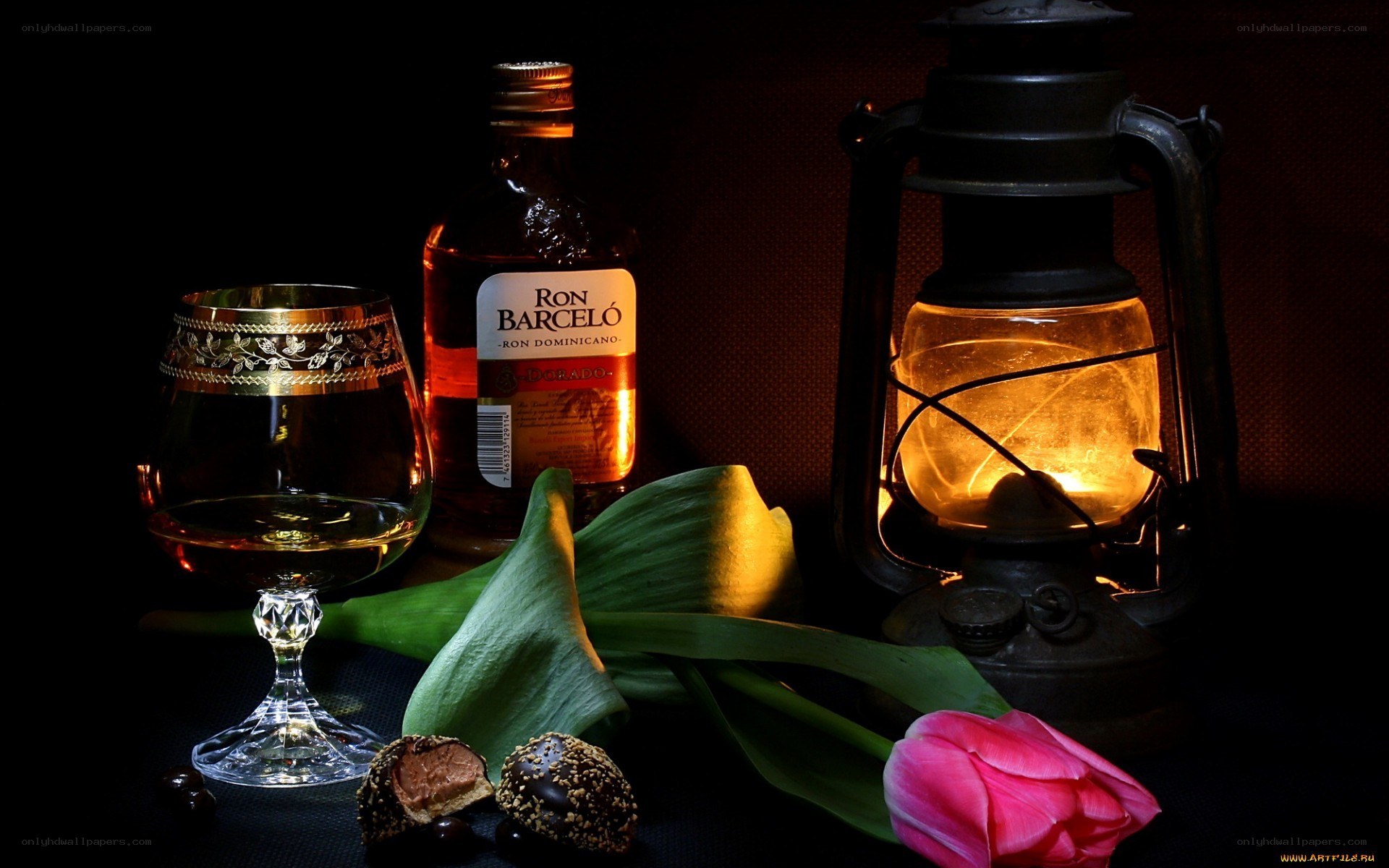 Still life with rum and lantern
