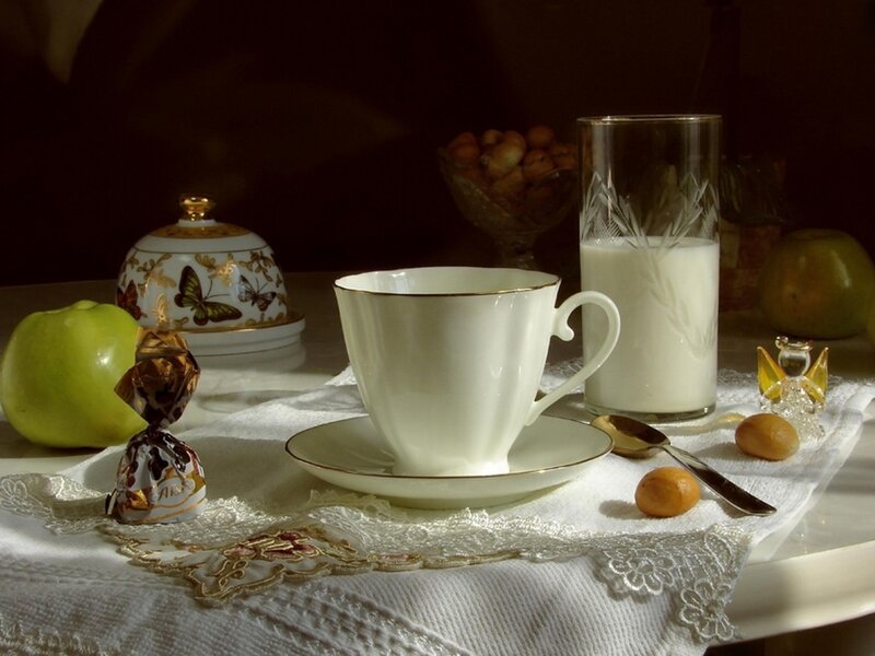 Still life with tea and milk