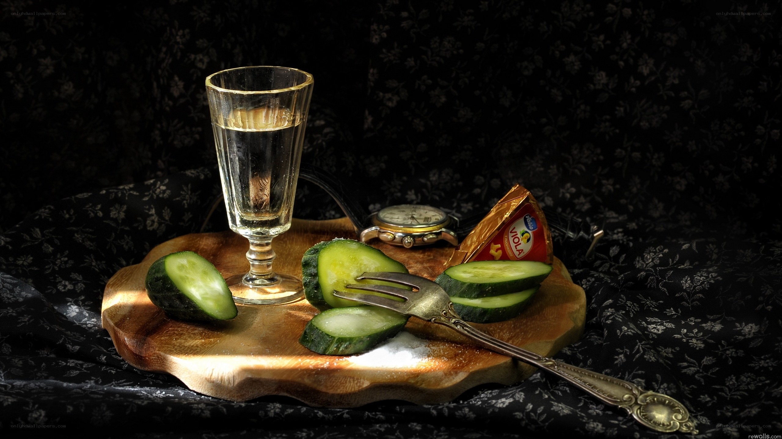 Still life with vodka and cucumbers