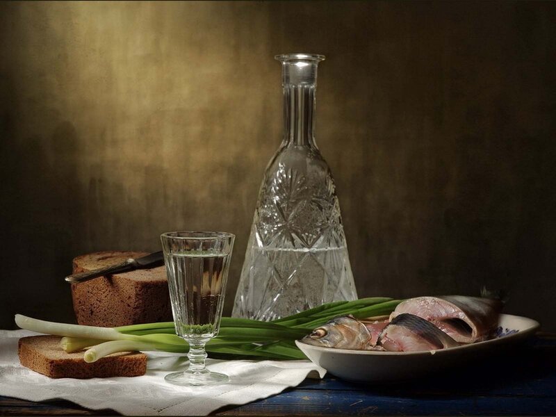 Still life with vodka and fish
