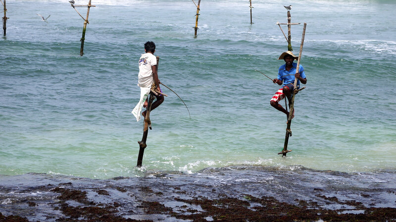Stilt Fishermen in Ocean