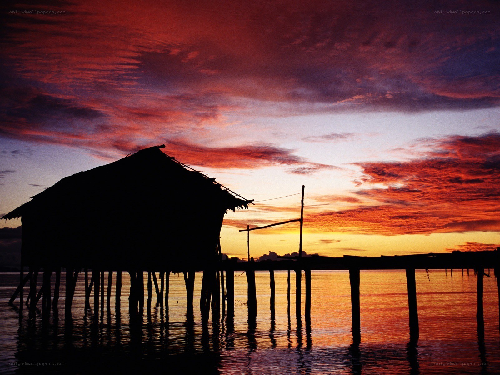 Stilt house at sunset