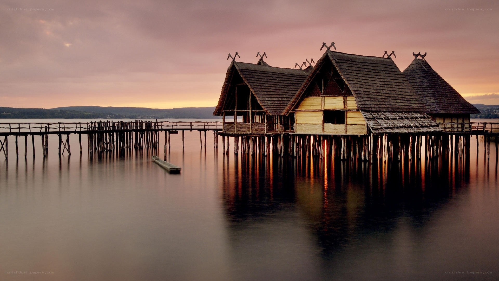 Stilt houses at sunset