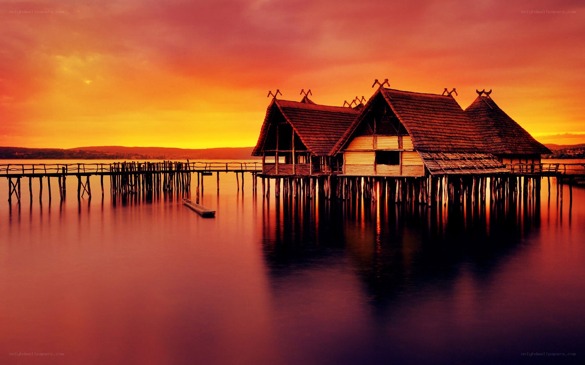 Stilt houses at sunset