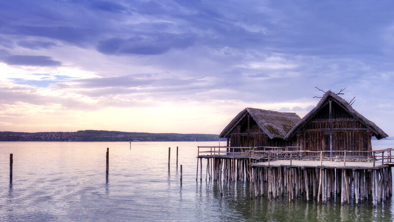 Stilt Houses on Lake — Blue, Serene