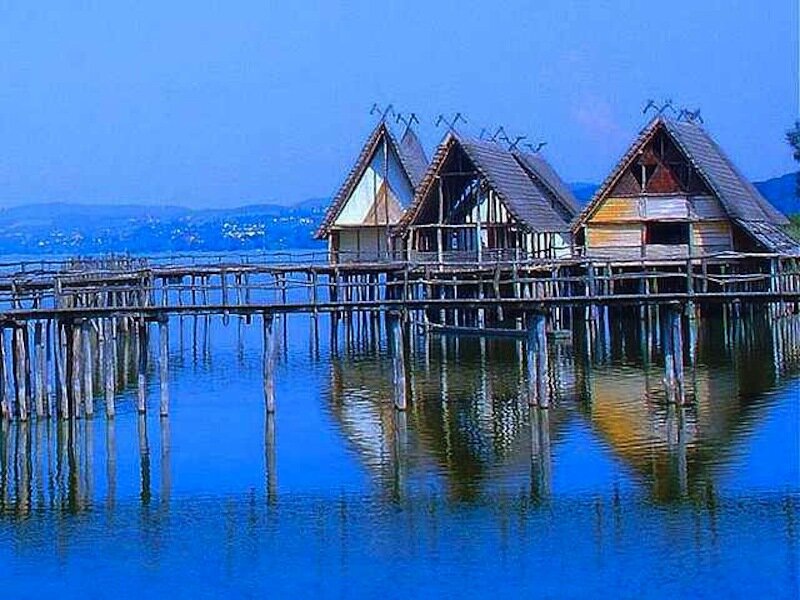 Stilt Houses on Lake — Blue