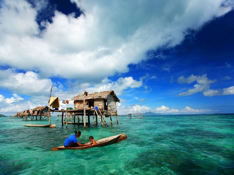 Stilt houses on turquoise water