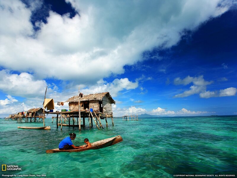 Stilt houses on turquoise water