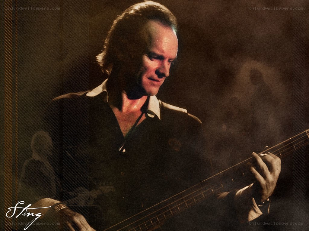 Sting playing bass guitar