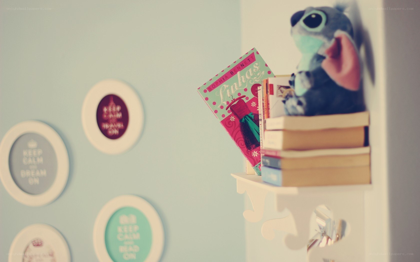 Stitch plush on a bookshelf