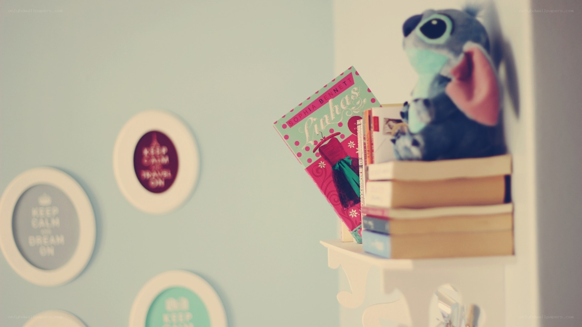 Stitch plush on bookshelf