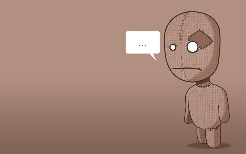 stitched doll with speech bubble