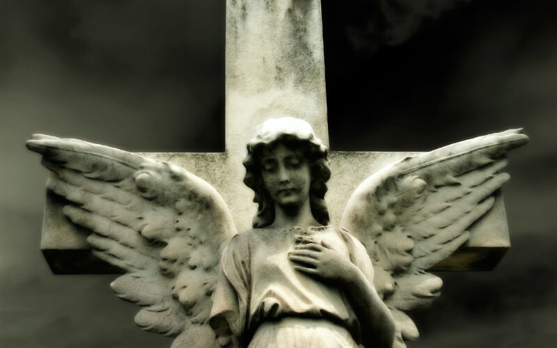 stone angel statue at cemetery