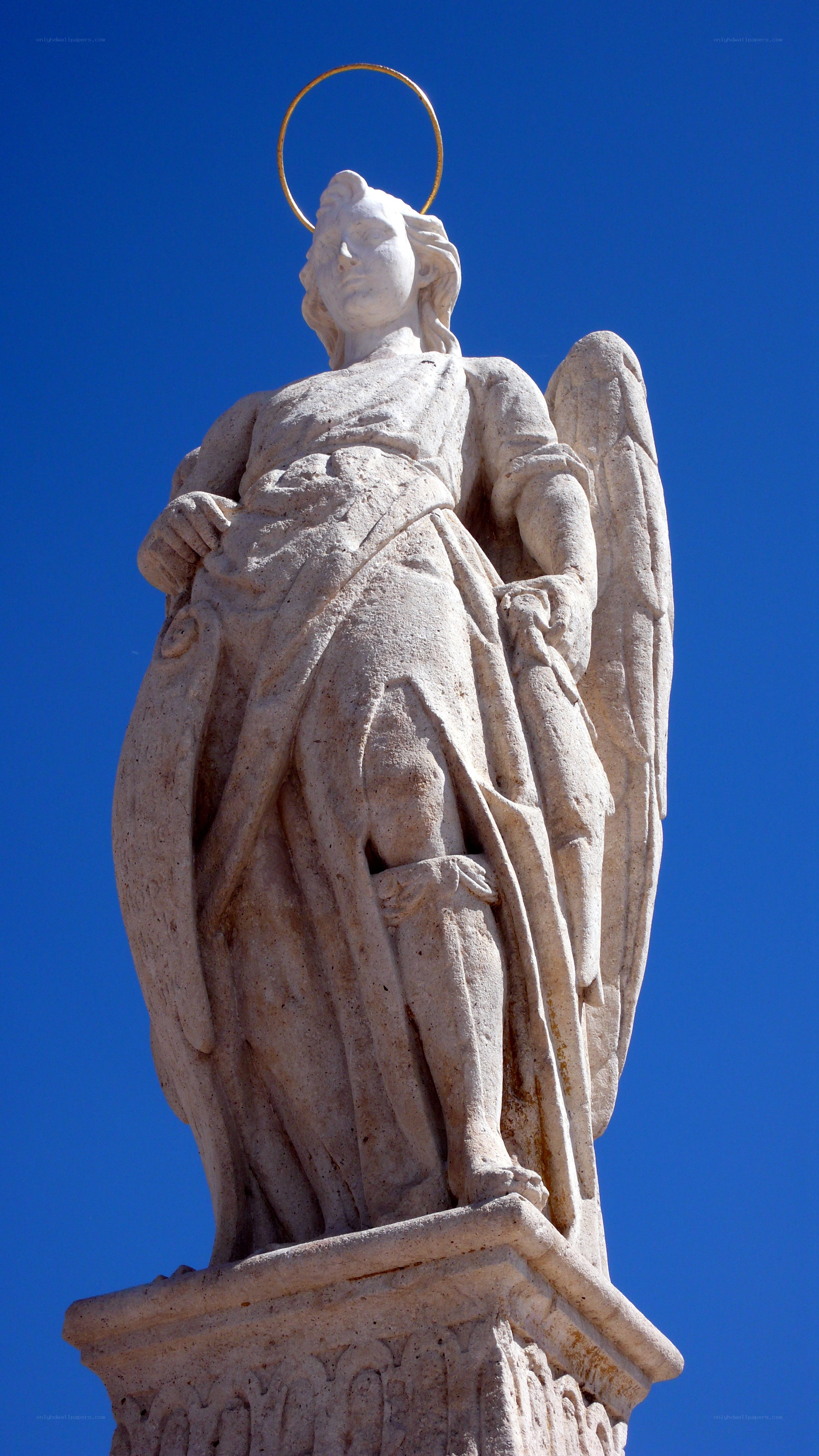 stone angel statue with halo