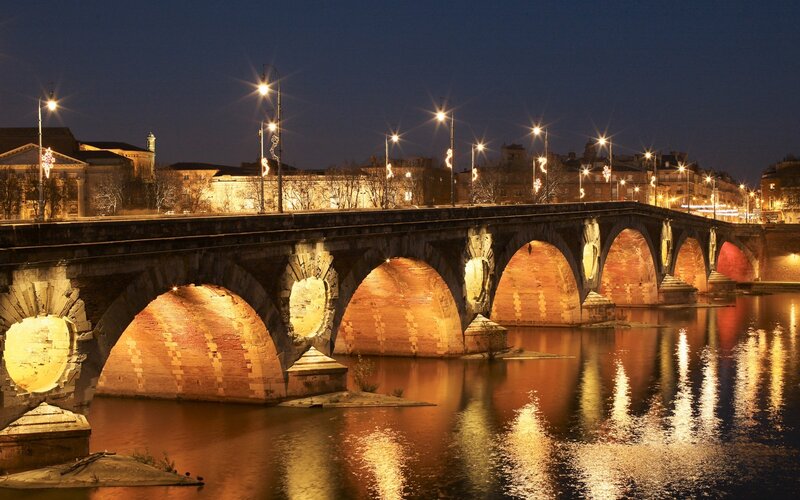 Stone Arch Bridge at Night — Orange, Serene