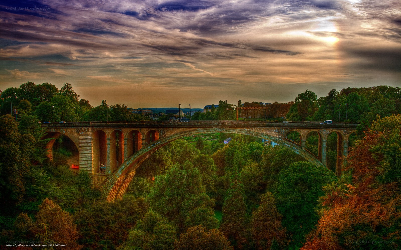 Stone arch bridge at sunset